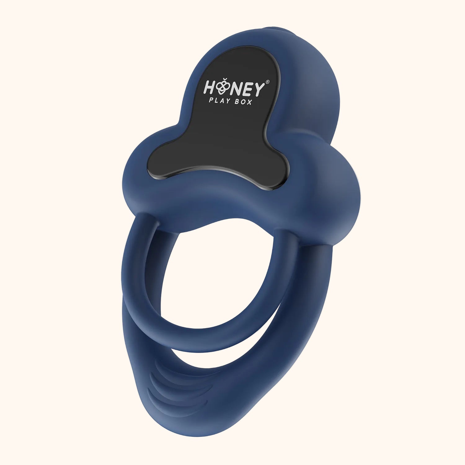 A dark blue Anello Honey Play Box cock ring againt a white background.