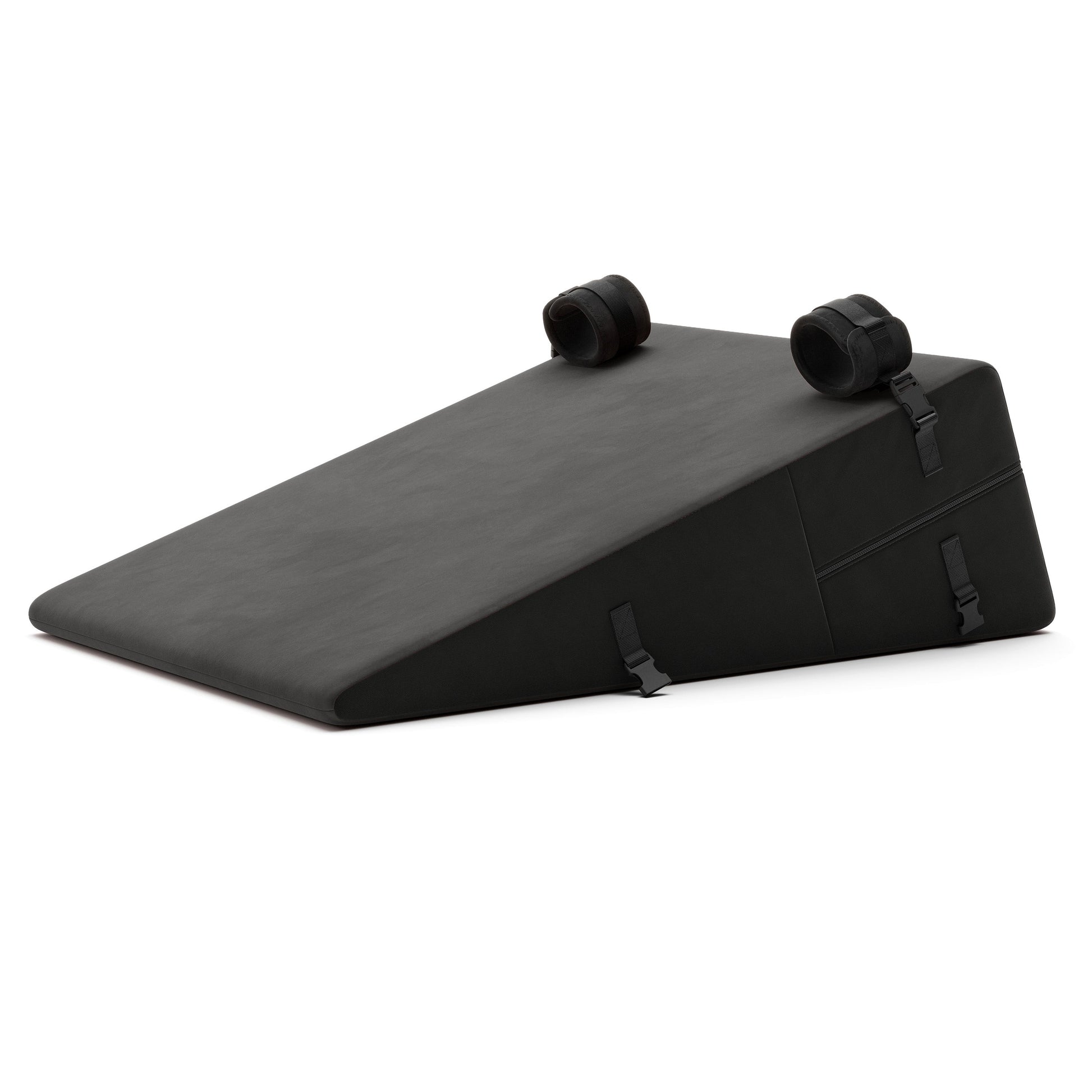 A black Bondage ramp, Bedroom Furniture by Liberator with handcuffs on a white background.