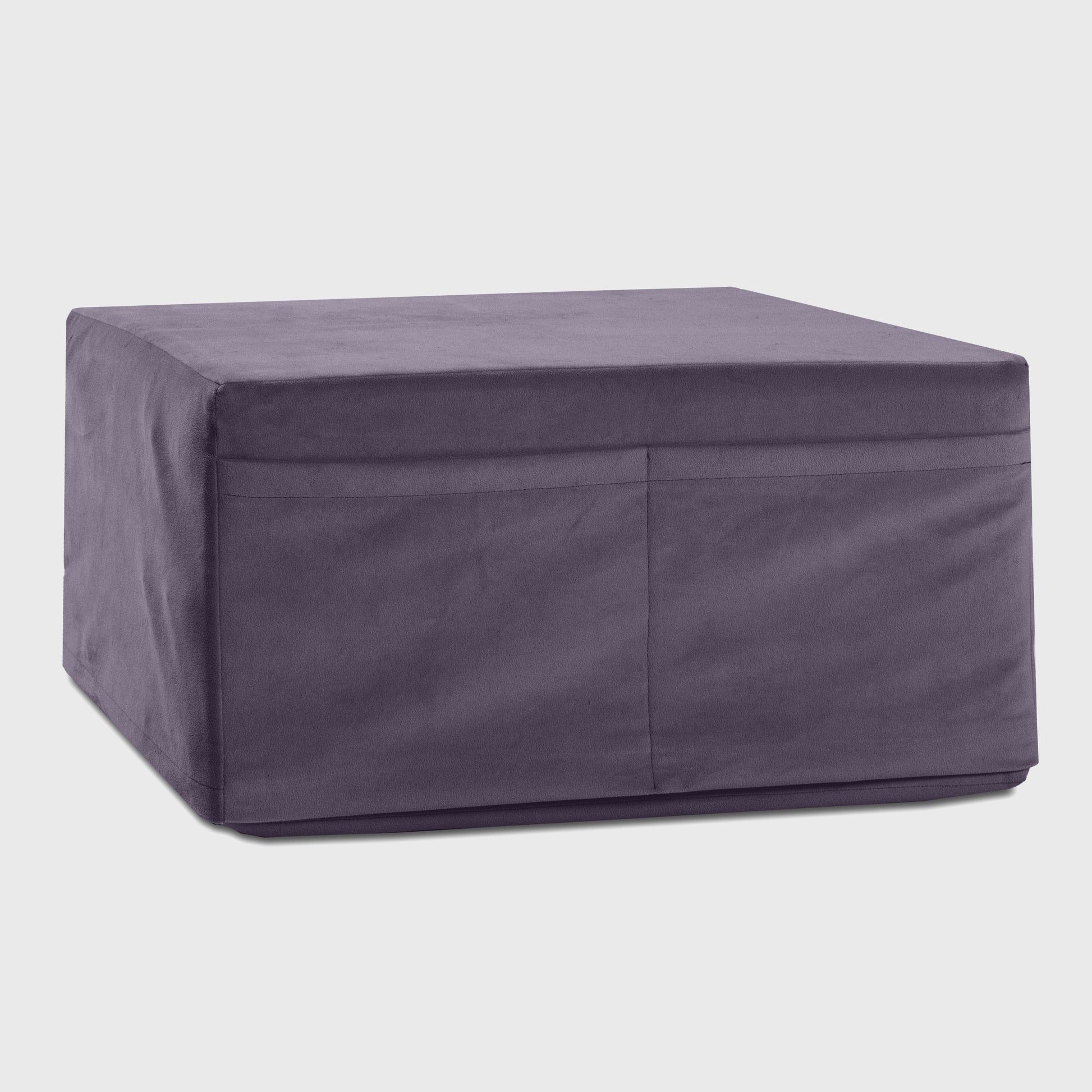 An Aubergine Center Stage ottoman, Bedroom Furniture folded up by Liberator against a white background.