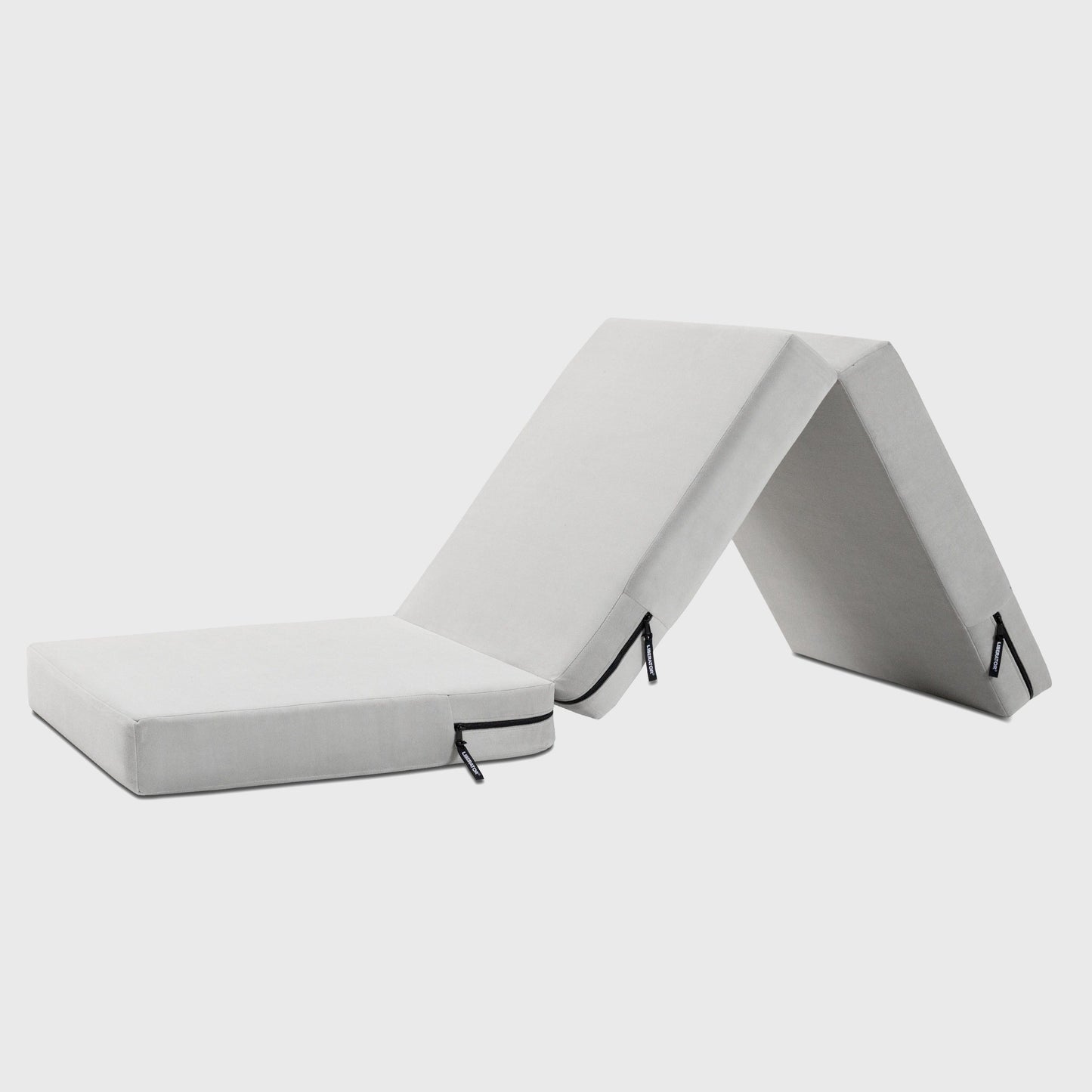 A grey Center Stage ottoman, Bedroom Furniture by Liberator unfolded against a white background.