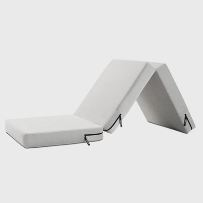 A grey Center Stage ottoman, Bedroom Furniture by Liberator unfolded against a white background.