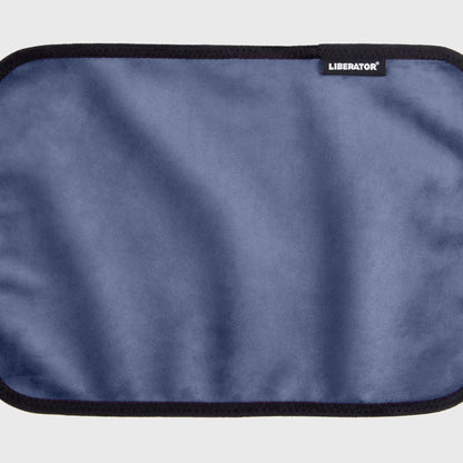 A blue Fascinator Splashproof Throws, Bedroom Furniture by Liberator unrolled up against a white background.