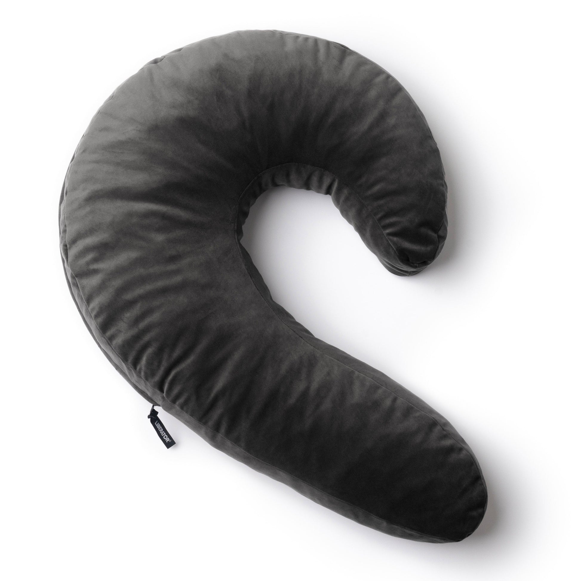 A black Lune Snuggle curved Pillow, Bedroom Furniture by Liberator against a white background.