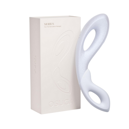 A white Mobius vibrators sitting next to it's box.