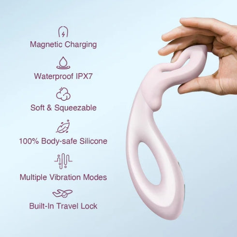 Pink silicone Mobius vibrator held by a hand with features listed on a light blue background.