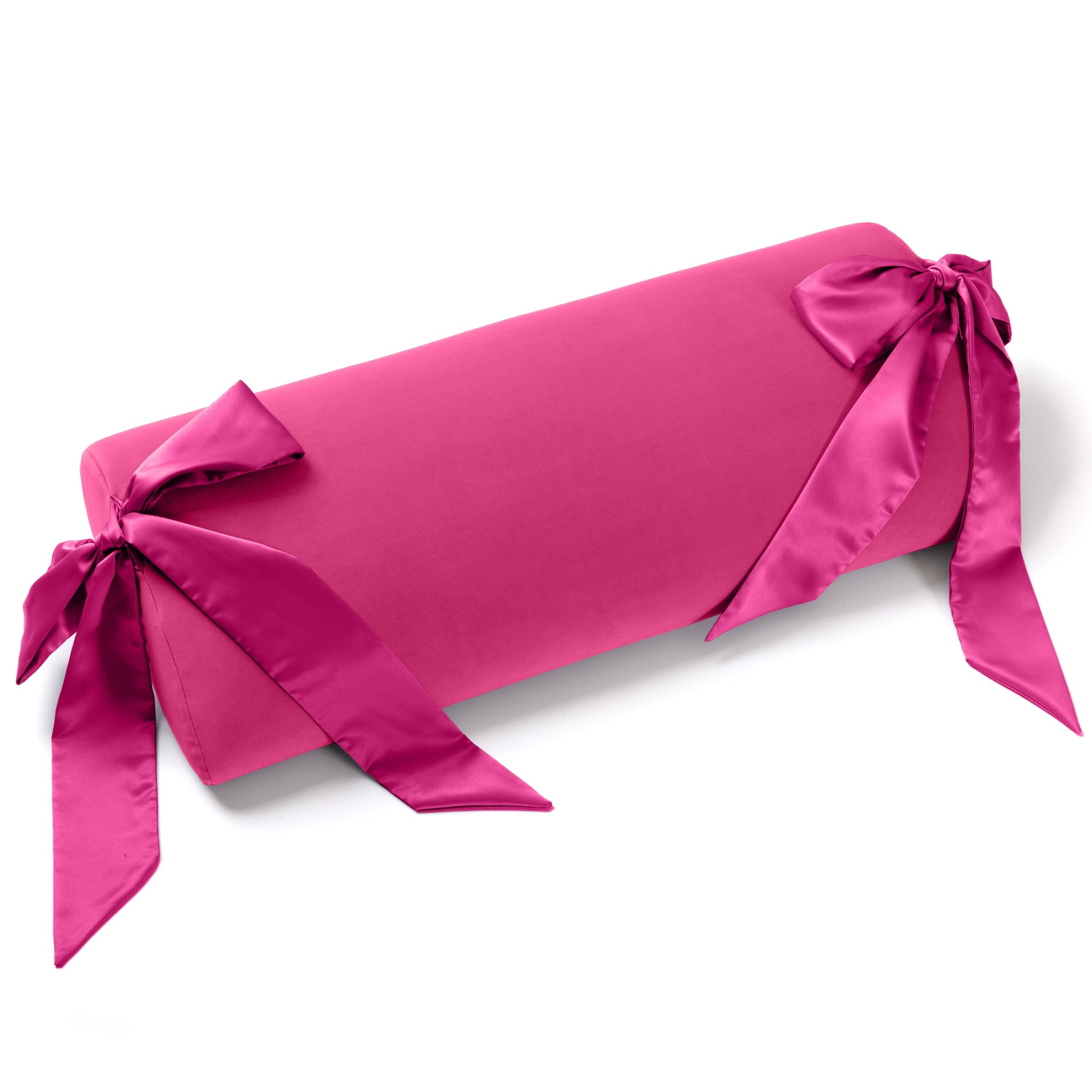 A pink Ravish Bondage Pillow, Bedroom Furniture by Liberator against a white background.