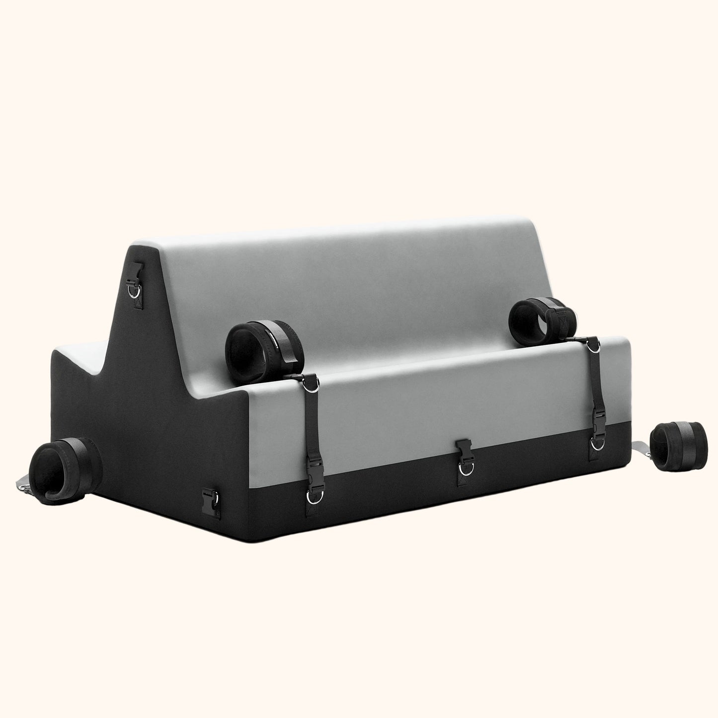 A grey and black Steed Spanking Bench bedroom furniture by Liberator  with cuffs against a white background.