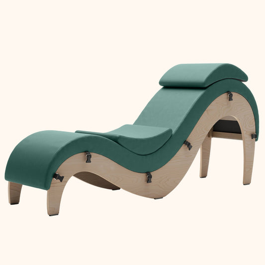 A coyote green Supervio Tantric Chaise with walnut, Bedroom Furniture by Liberator against a white background.