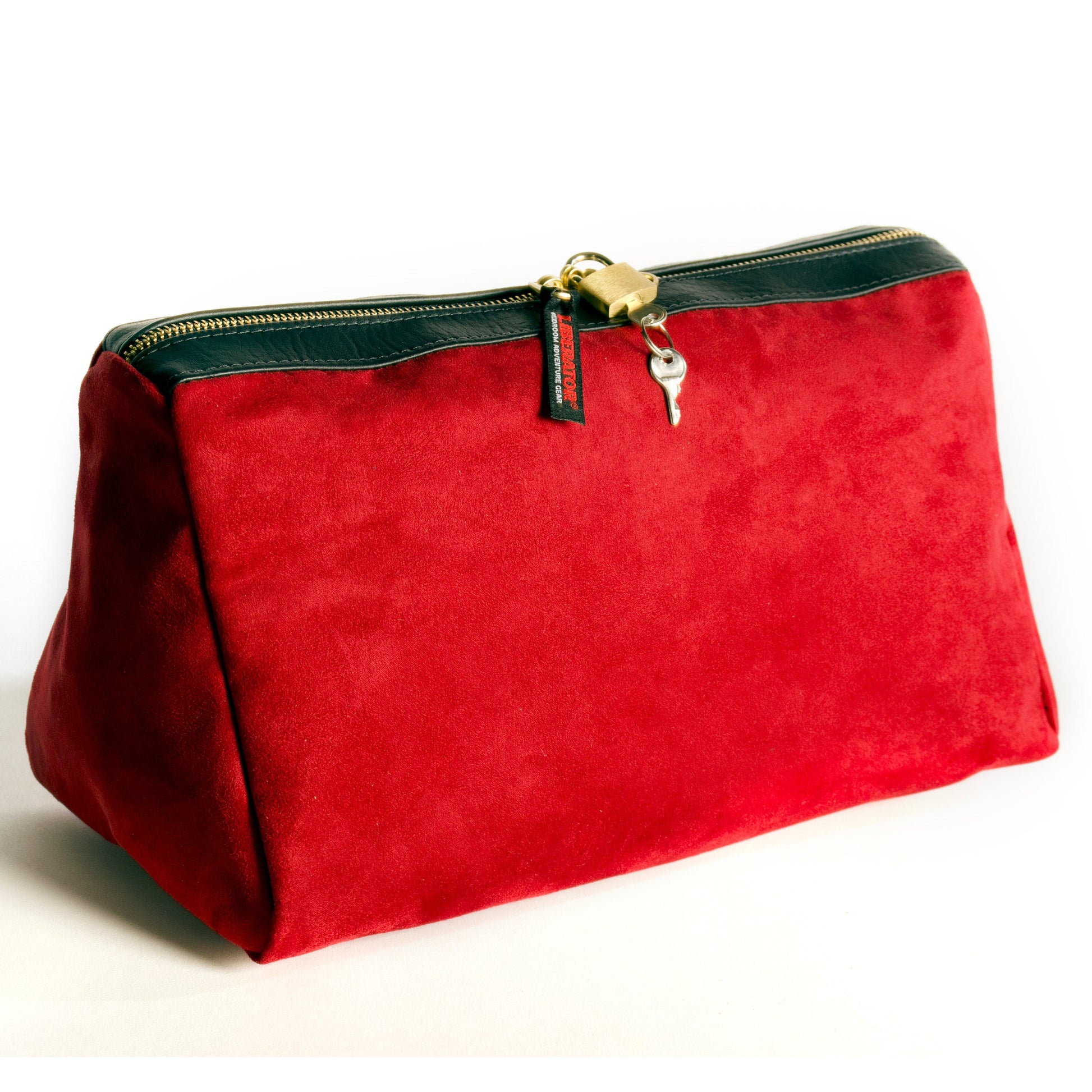 A cinnabar red Tallulah Locking Toy Bag by Liberator with key and lock against a white background.