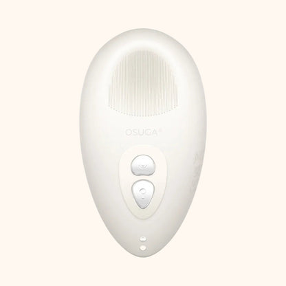 A white Tremble clitoral vibrator by Liberator against a white background.