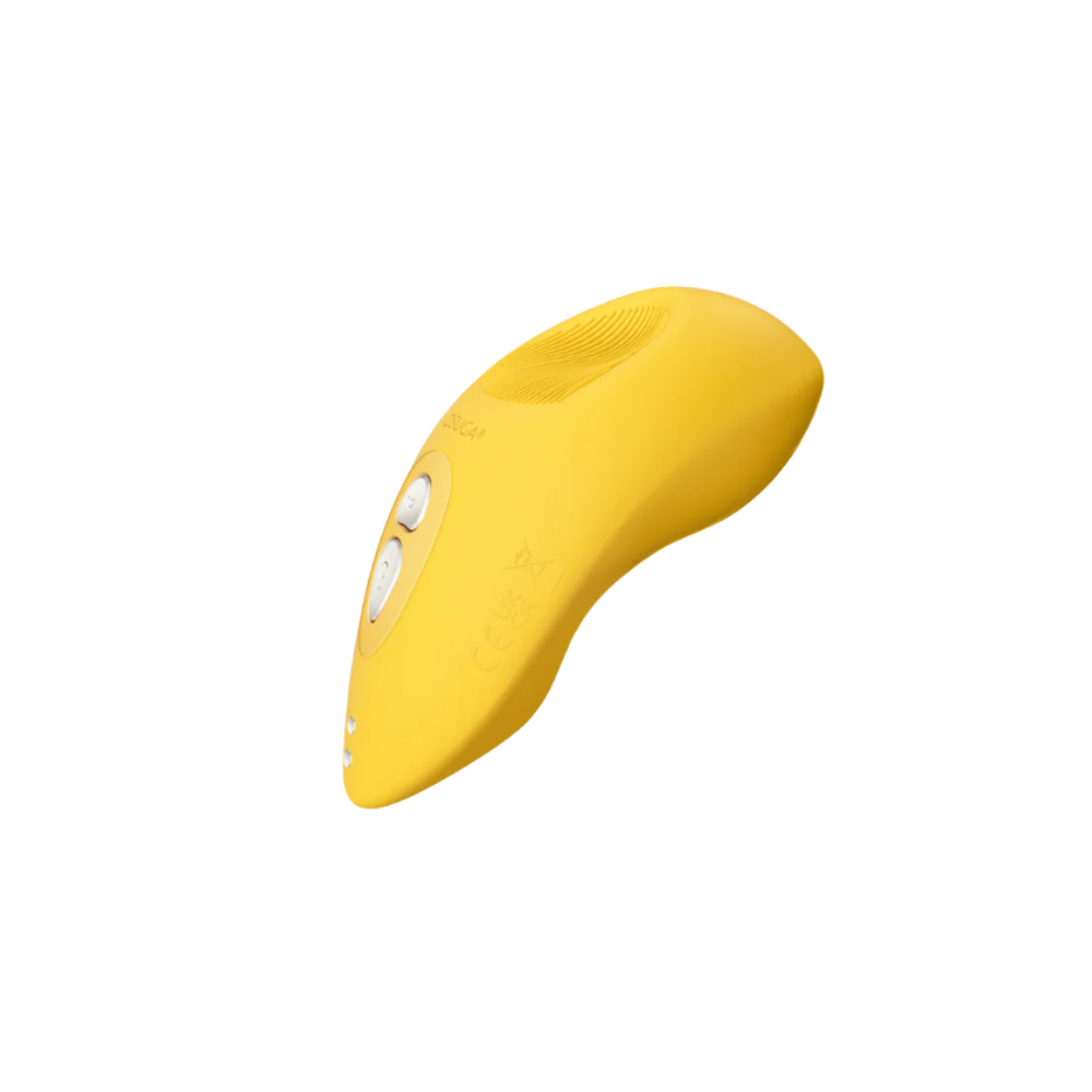 A yellow Tremble clitoral vibrator by Liberator.