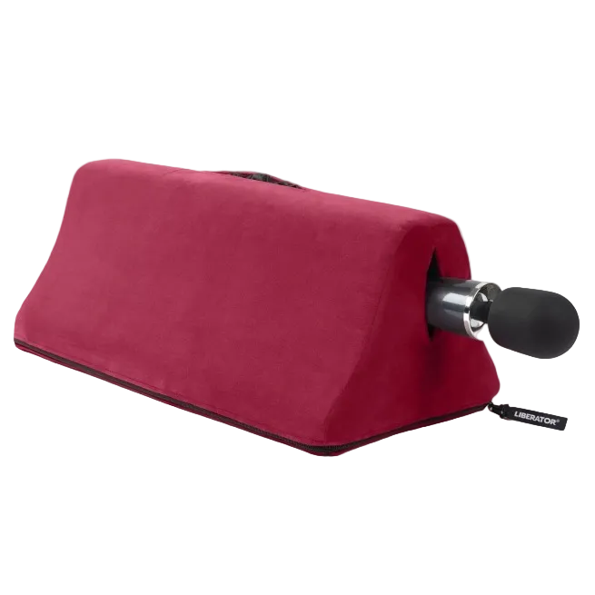 A merlot Tula Toy Mount, Bedroom Furniture by Liberator holding a Wand toy.