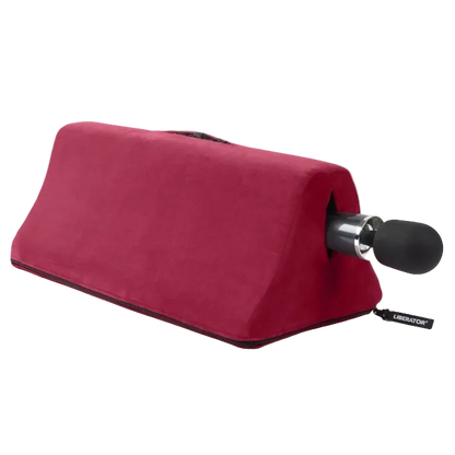 A merlot Tula Toy Mount, Bedroom Furniture by Liberator holding a Wand toy.