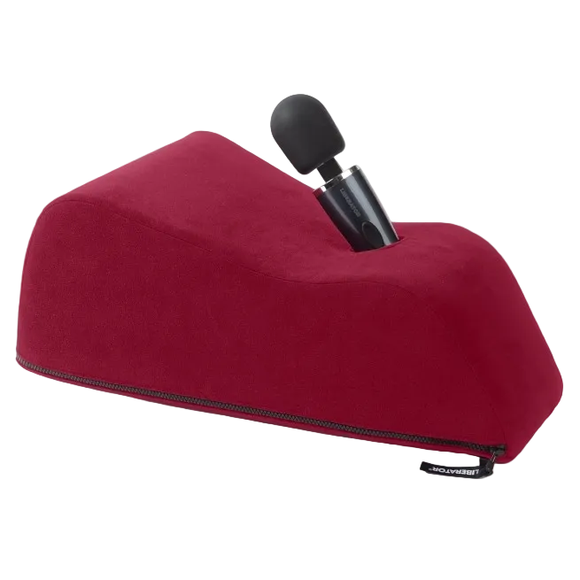 A merlot Wanda Toy Mount, Bedroom Furniture by Liberator holding a wand.